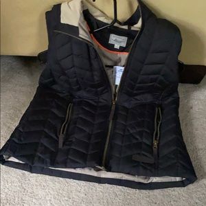 Black vest with hood.